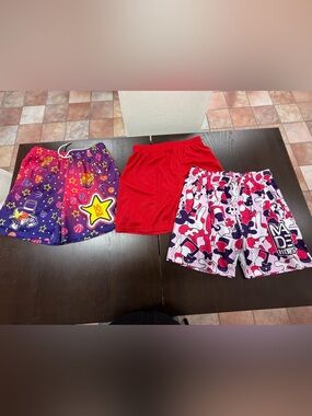 Three pairs of size medium made hoops women’s basketball shorts